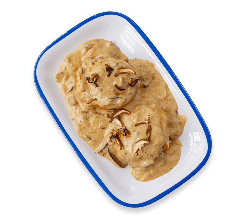 Picture of The Boomer biscuits and gravy dish with mushrooms on a rectangular plate