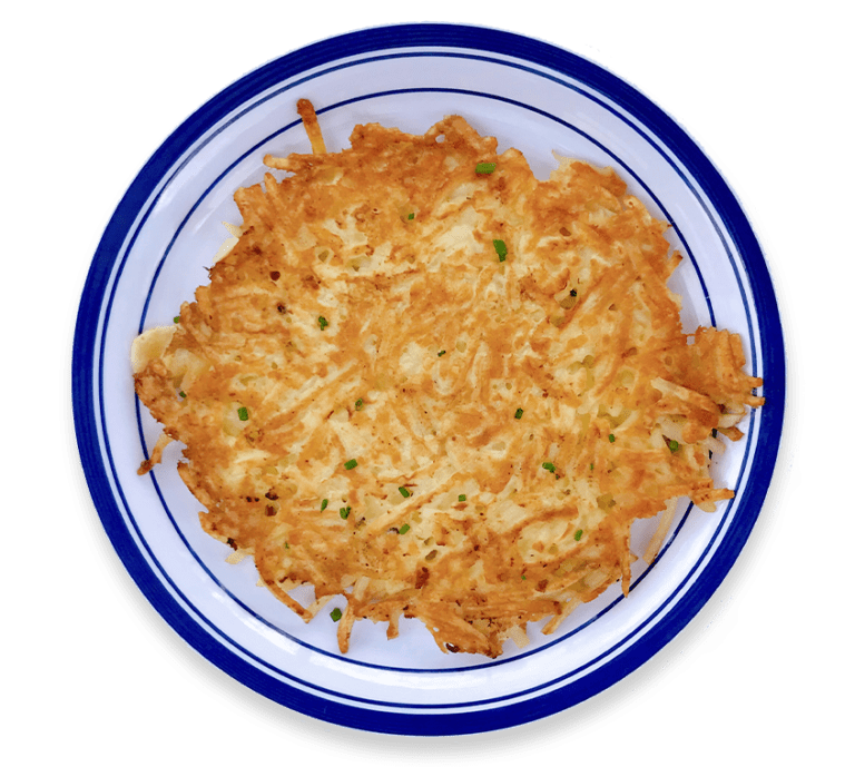 Cut out picture of a side of hash browns on a blue and white plate