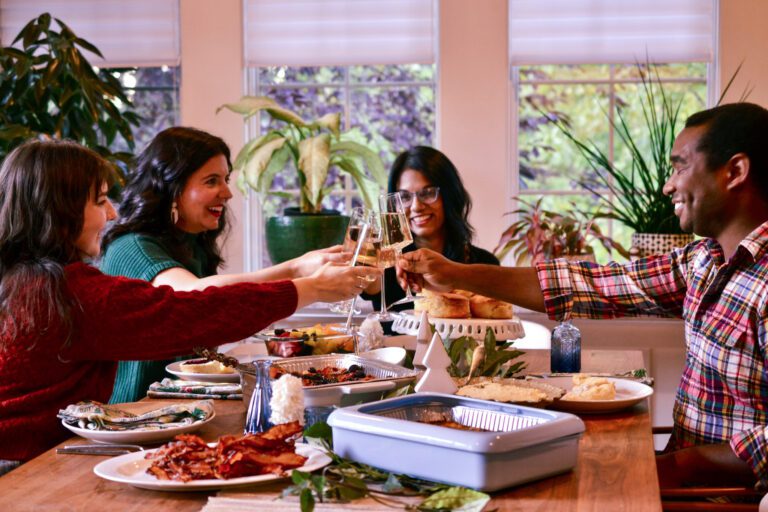 Friends gathered to enjoy a Hassle-Free Holiday Brunch Catering with Biscuit Belly!