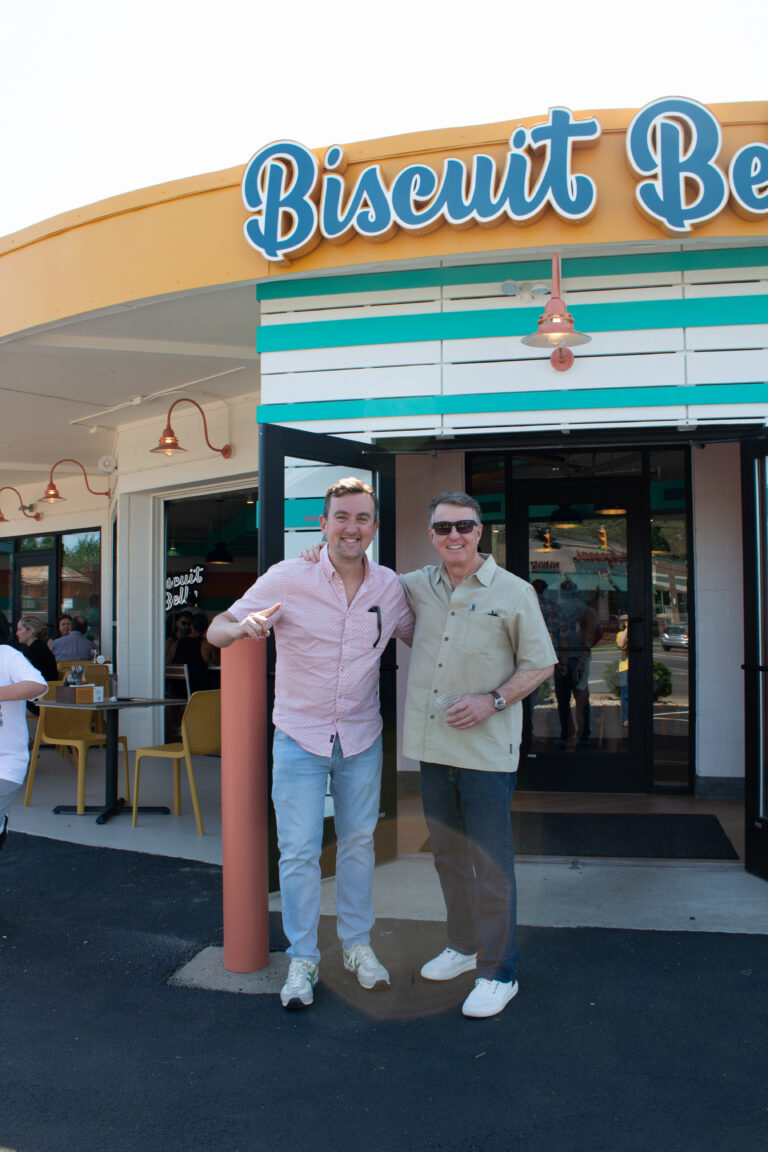 Two Men at outside Biscuit belly front entrance